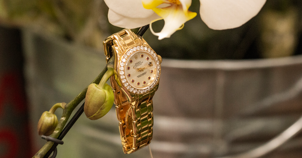 Gold Rolex Masterpiece with diamonds.