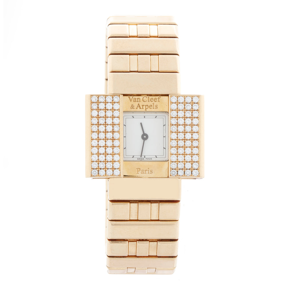 Gold watch with diamond accents on a white background