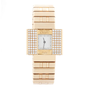 Gold watch with diamond accents on a white background