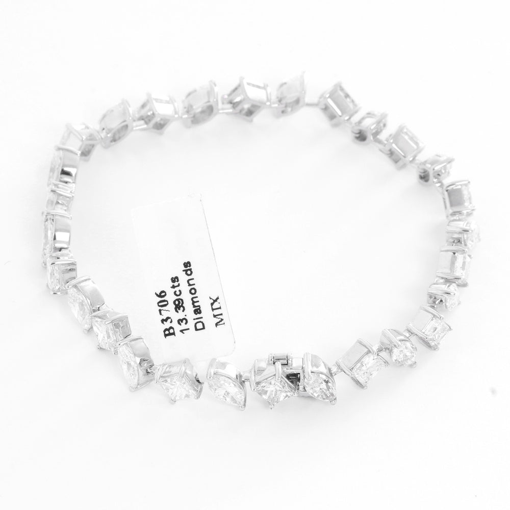 Stunning 18K White gold Tennis Bracelet 13.39 cts.