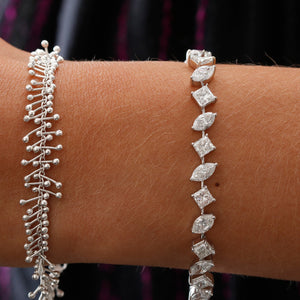 Stunning 18K White gold Tennis Bracelet 13.39 cts.