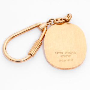 Patek Philippe & Co. Gold Ellipse Keychain