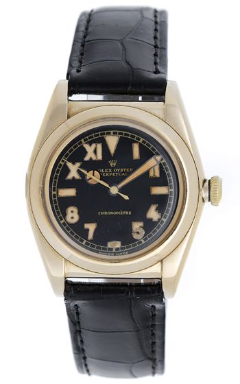 Vintage Rolex Yellow Gold Oyster Perpetual Bubbleback Black Roman Arabic Dial Model 3131 Watch