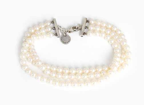 Return to Tiffany™ Heart Charm on a pearl bracelet in sterling silver