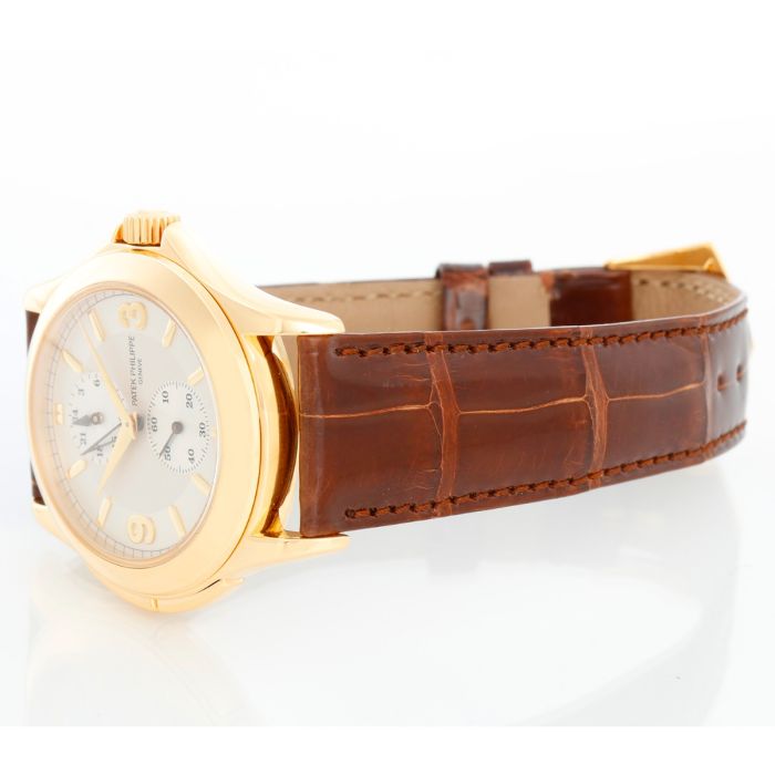 Collectible Patek Philippe Travel Time 18k Gold Watch 5134J