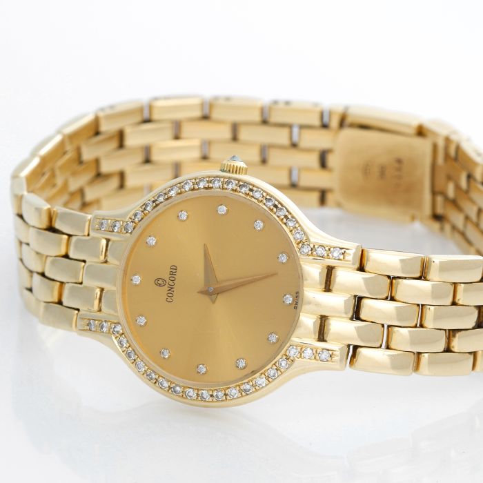 Concord ladies gold and diamond watch 2025