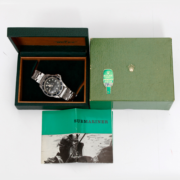 A Rolex Submariner Ref 5513 with its original box and instruction manuals.