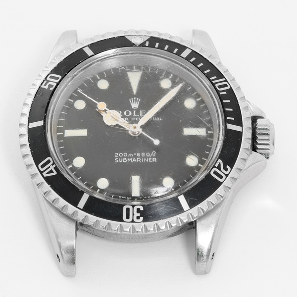 Rolex Submariner Ref 5513 with a black bezel insert.