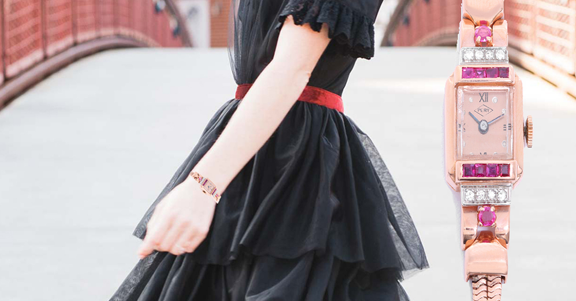 A lady wearing vintage womens watch in a little black dress.