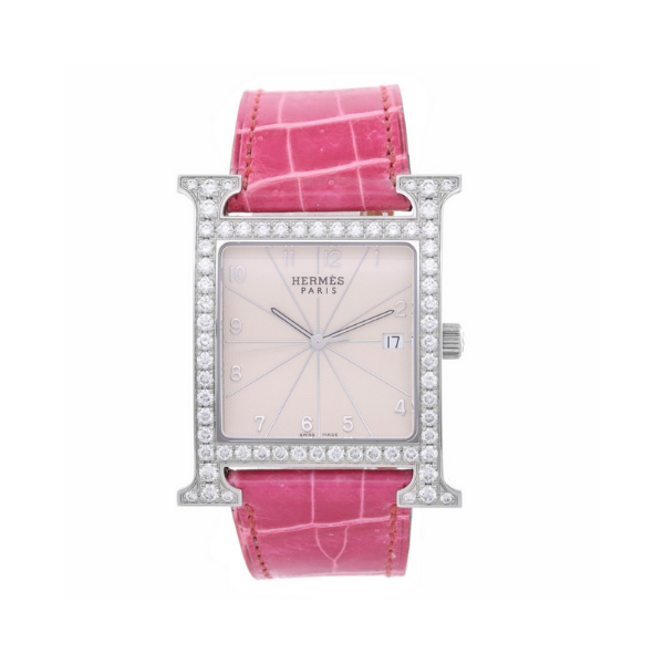 Hermes Stainless Steel Heure Watch features an “H” shaped diamond bezel and a hot pink leather strap.