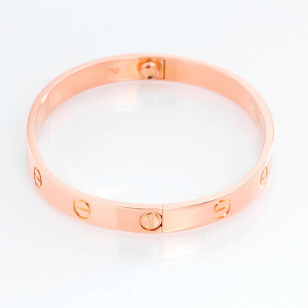 Cartier love bracelet in rose gold.