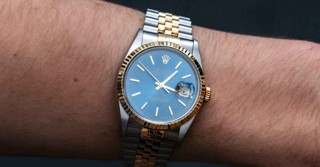 Rolex 16233 Men's Two-tone watch with blue stick dial.
