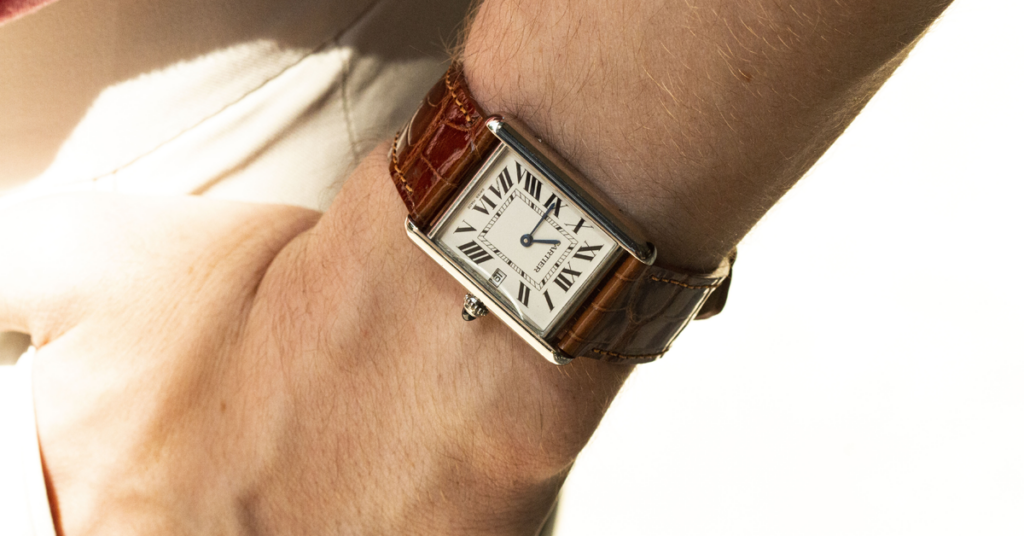 cartier tank on wrist