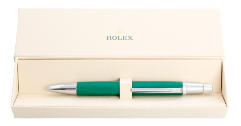 Green Rolex Ballpoint Push Pen with blue ink.